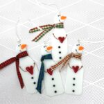 snowman with heart and scarf